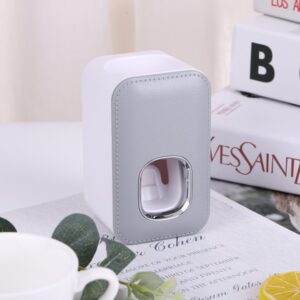 Automatic toothpaste dispenser in grey